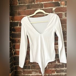 White long sleeved body suit